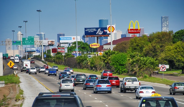 Interstate traffic towards Downtown Houston on a sunny day